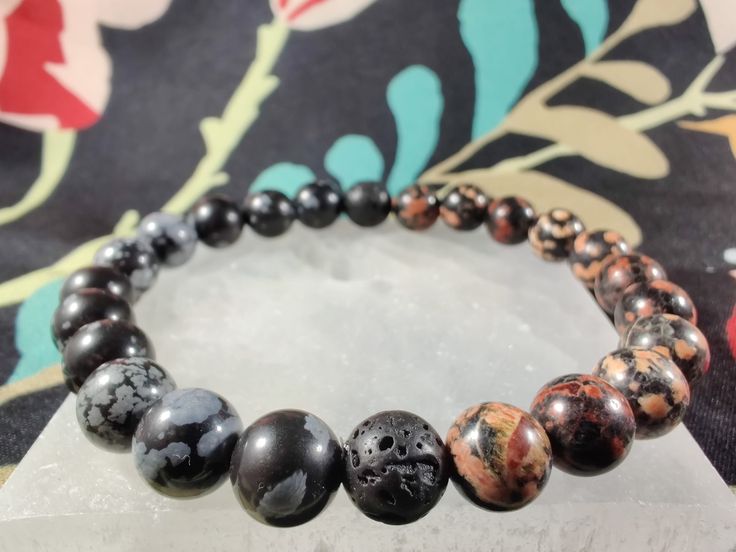 red snowflake obsidian bead bracelet
