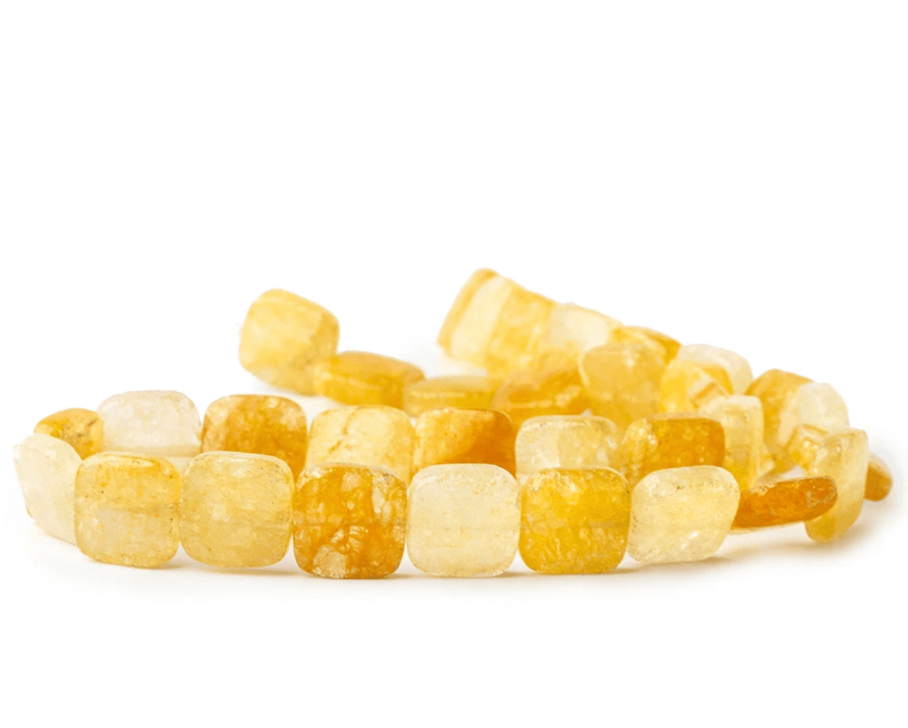 yellow crystal beads sewn together to form bracelets