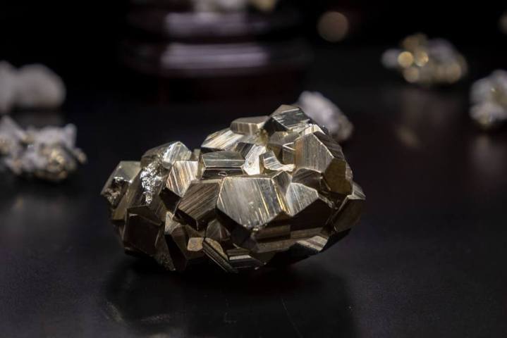 silver unpolished crystal rock black background