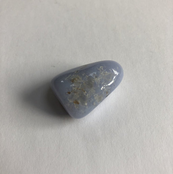 Blue Agate Tumbled crystal on white background