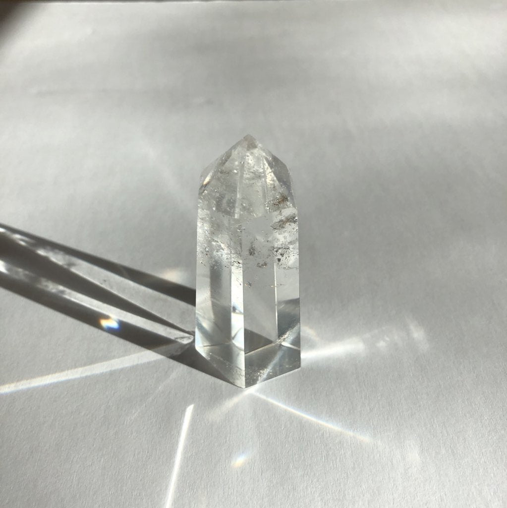 Quartz Point crystal on white background